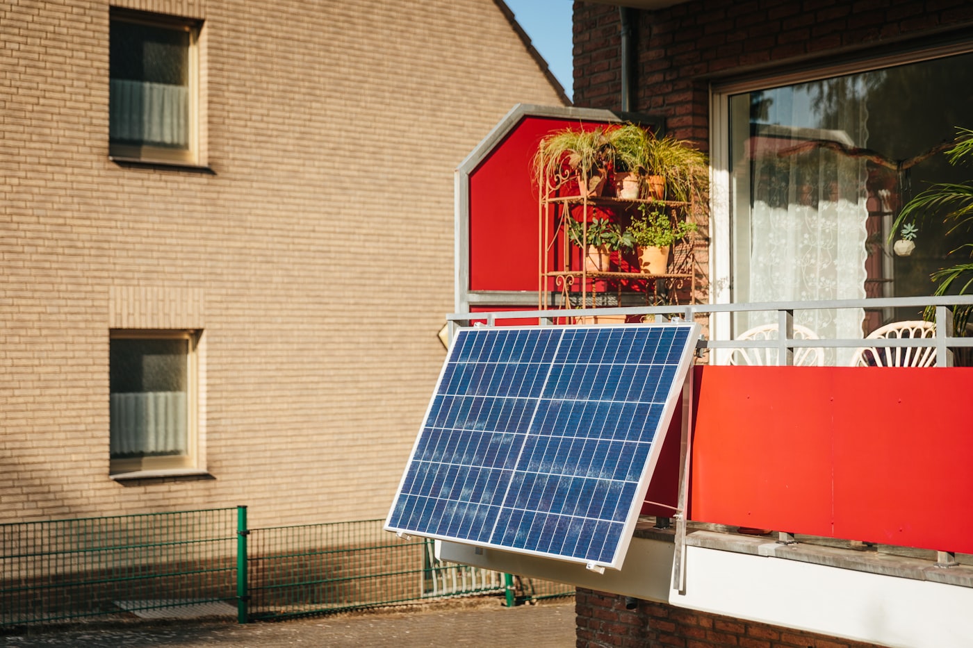 Solar panel mounted on an apartment balcony